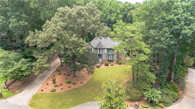 bird's eye view featuring a forest view