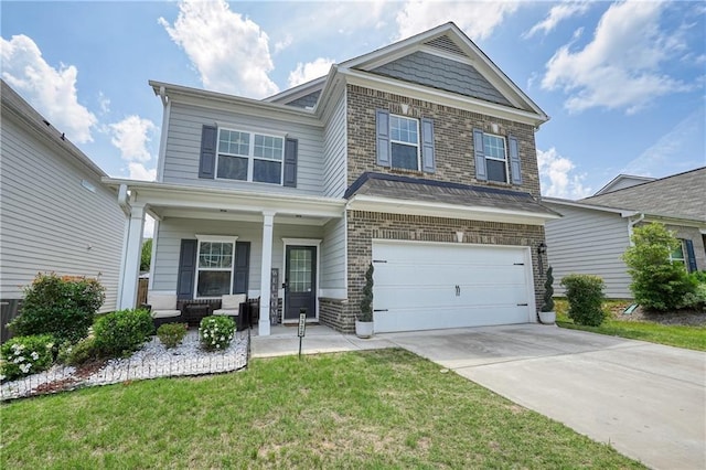 5322 Burrus Ln SW, Mableton, GA 30126 - view of front of property with a porch, a garage, brick siding, concrete driveway, and a front yard