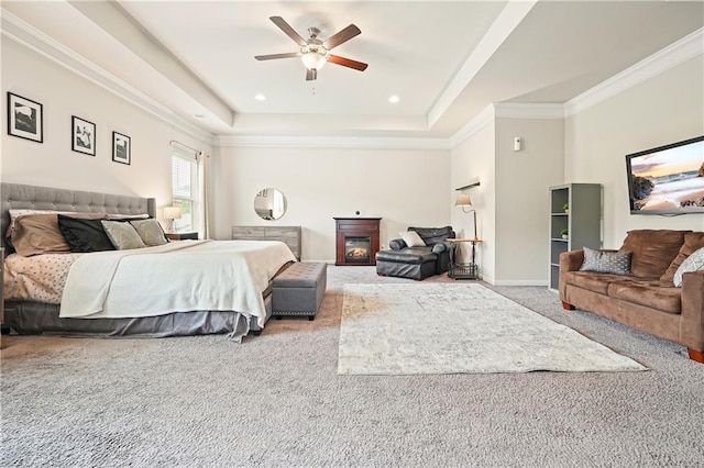5322 Burrus Ln SW, Mableton, GA 30126 - bedroom featuring carpet floors, a tray ceiling, crown molding, baseboards, and a ceiling fan