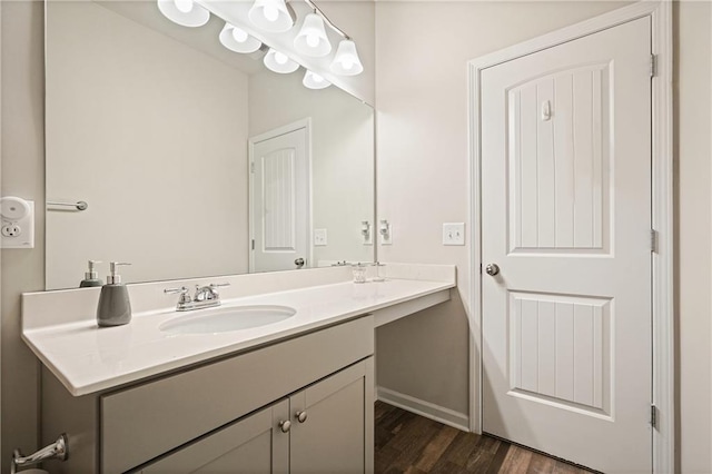5322 Burrus Ln SW, Mableton, GA 30126 - bathroom with wood finished floors, vanity, and baseboards