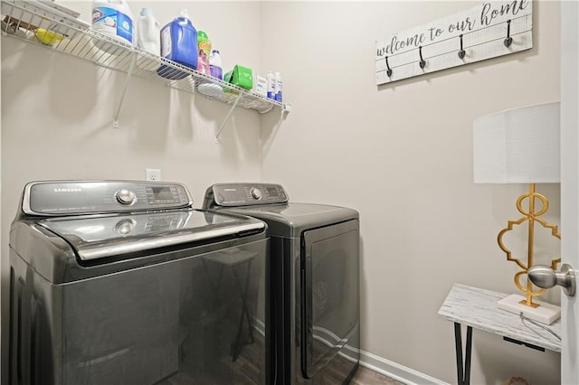 5322 Burrus Ln SW, Mableton, GA 30126 - laundry room with washing machine and dryer and baseboards