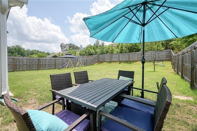 5322 Burrus Ln SW, Mableton, GA 30126 - view of patio featuring a playground and outdoor dining space