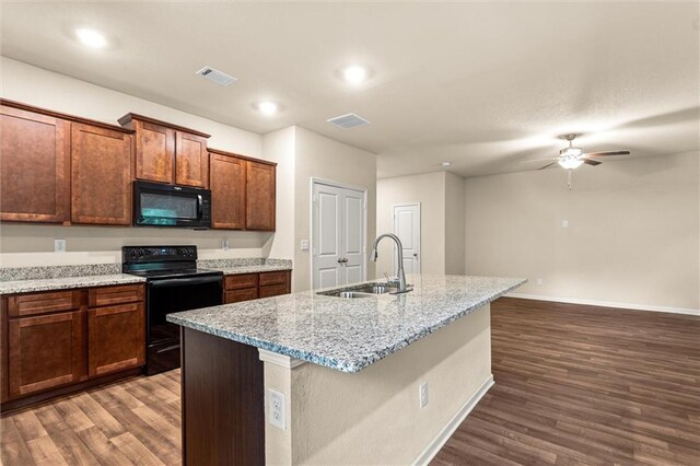 10786 Wheeler Trce, Hampton, GA 30228 - kitchen featuring black appliances, a sink, wood finished floors, a ceiling fan, and recessed lighting