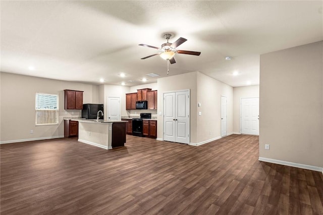 10786 Wheeler Trce, Hampton, GA 30228 - kitchen with black appliances, open floor plan, ceiling fan, a sink, and recessed lighting