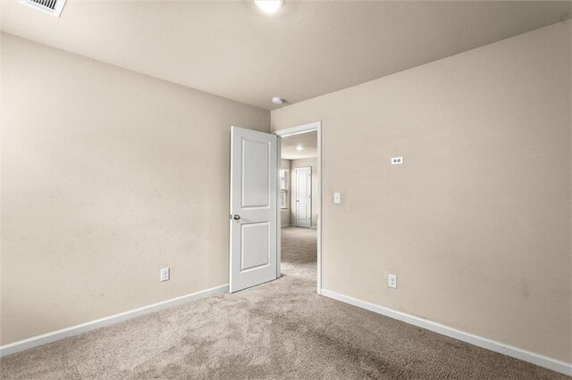 10786 Wheeler Trce, Hampton, GA 30228 - carpeted empty room with baseboards