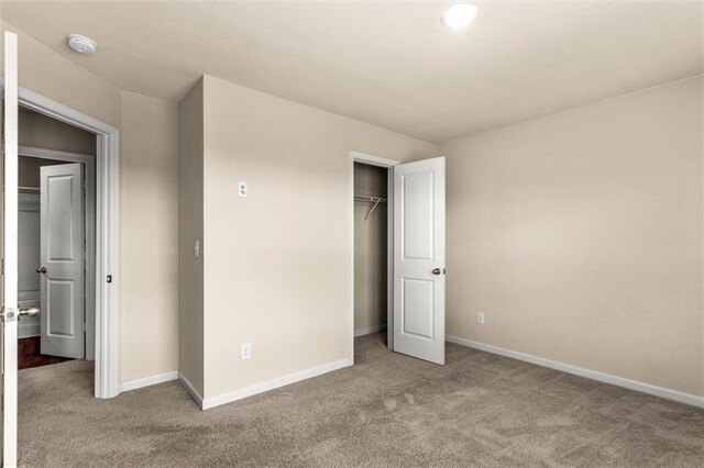 10786 Wheeler Trce, Hampton, GA 30228 - unfurnished bedroom with carpet and baseboards