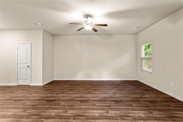 10786 Wheeler Trce, Hampton, GA 30228 - empty room with ceiling fan, wood finished floors, and baseboards