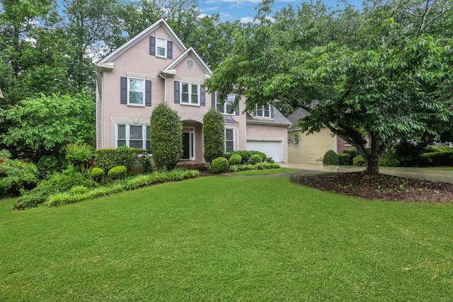 11280 Brookhollow Trl, Alpharetta, GA 30022 - view of front of property with a garage, a front yard, stucco siding, and concrete driveway