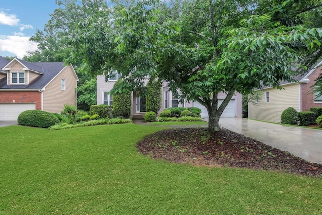 11280 Brookhollow Trl, Alpharetta, GA 30022 - obstructed view of property featuring driveway, a front lawn, brick siding, and a garage