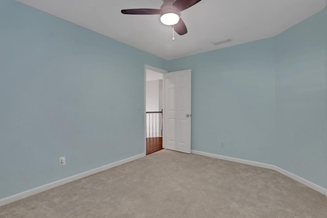 11280 Brookhollow Trl, Alpharetta, GA 30022 - unfurnished bedroom with light carpet, baseboards, and a ceiling fan