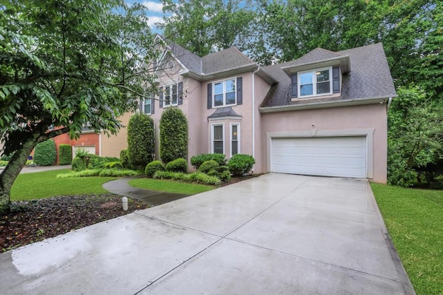 11280 Brookhollow Trl, Alpharetta, GA 30022 - view of front facade with stucco siding, concrete driveway, a garage, a shingled roof, and a front yard