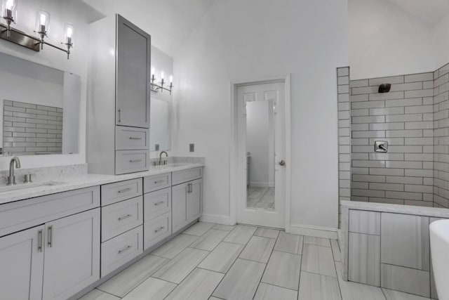 11280 Brookhollow Trl, Alpharetta, GA 30022 - full bath with double vanity, tiled shower, baseboards, and a freestanding bath
