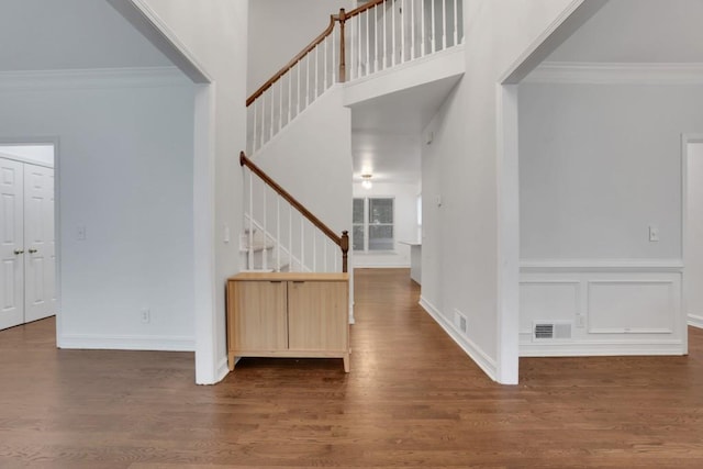 11280 Brookhollow Trl, Alpharetta, GA 30022 - entryway featuring stairway, ornamental molding, wood finished floors, and a towering ceiling