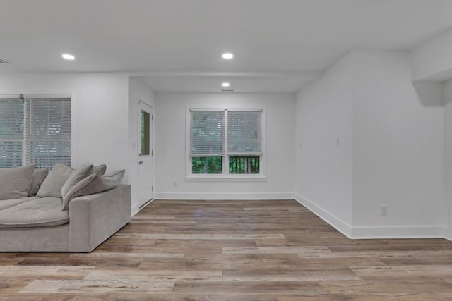 11280 Brookhollow Trl, Alpharetta, GA 30022 - living area featuring recessed lighting, wood finished floors, and baseboards