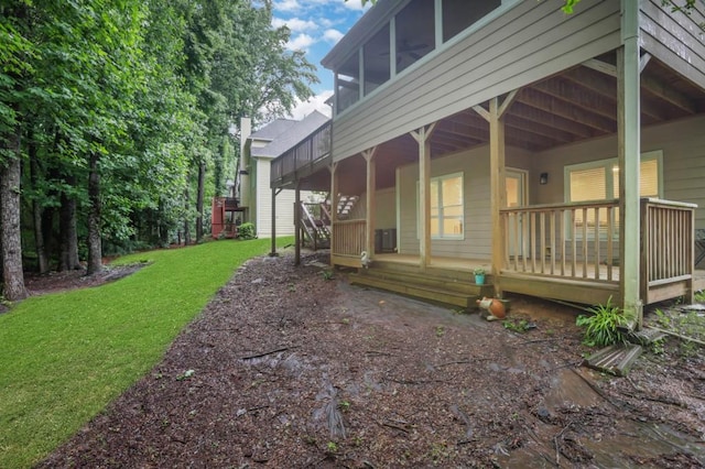 11280 Brookhollow Trl, Alpharetta, GA 30022 - view of property exterior featuring a lawn and a sunroom