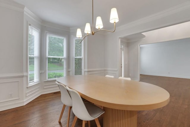11280 Brookhollow Trl, Alpharetta, GA 30022 - dining room featuring a chandelier, healthy amount of natural light, dark wood-style flooring, ornamental molding, and a wainscoted wall