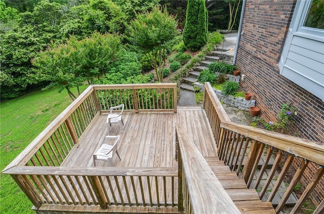wooden deck with a yard