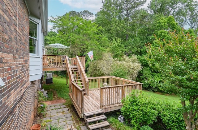 deck with central air condition unit and stairs
