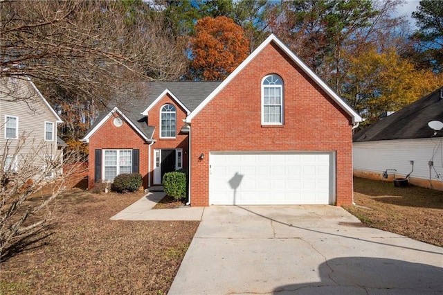 front of property with a garage