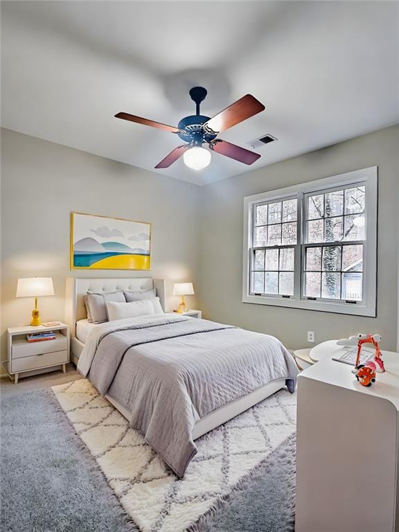 bedroom featuring carpet and ceiling fan