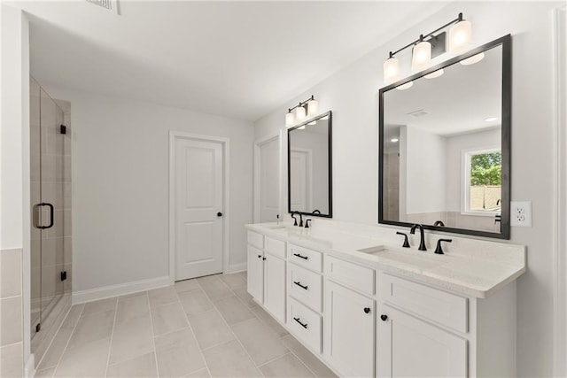 418 Brookstone Trl, Dawsonville, GA 30534 - full bath featuring double vanity, a shower stall, tile patterned flooring, and baseboards