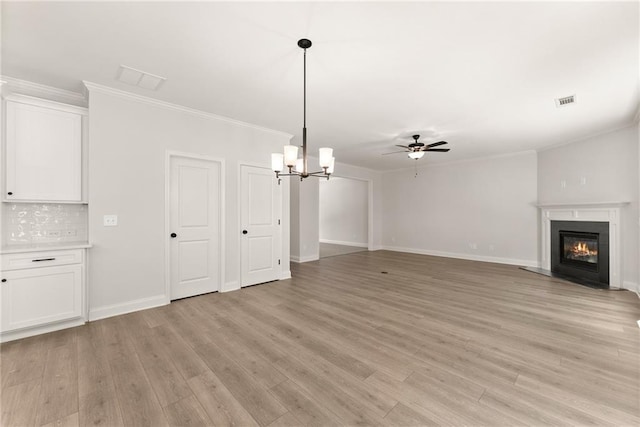 418 Brookstone Trl, Dawsonville, GA 30534 - unfurnished living room featuring crown molding, a fireplace with flush hearth, light wood finished floors, baseboards, and ceiling fan