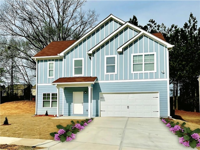 view of front of property with a garage