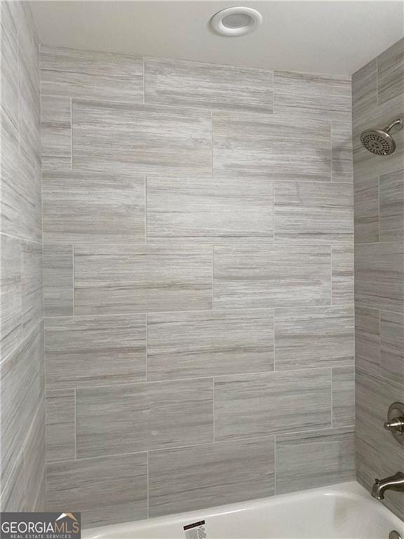 full bathroom featuring washtub / shower combination
