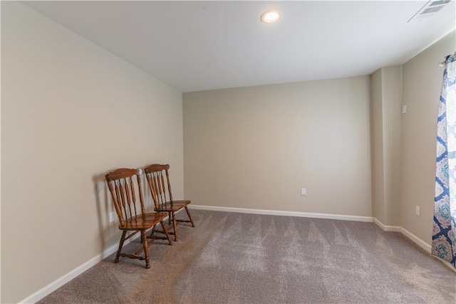 living area featuring carpet flooring