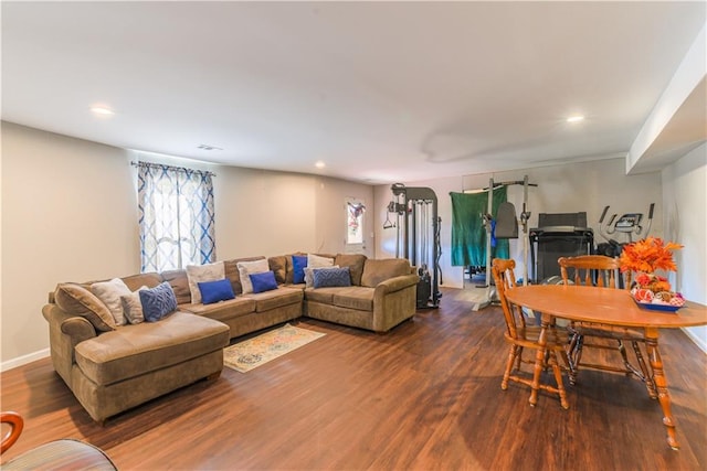 living room with dark wood-type flooring