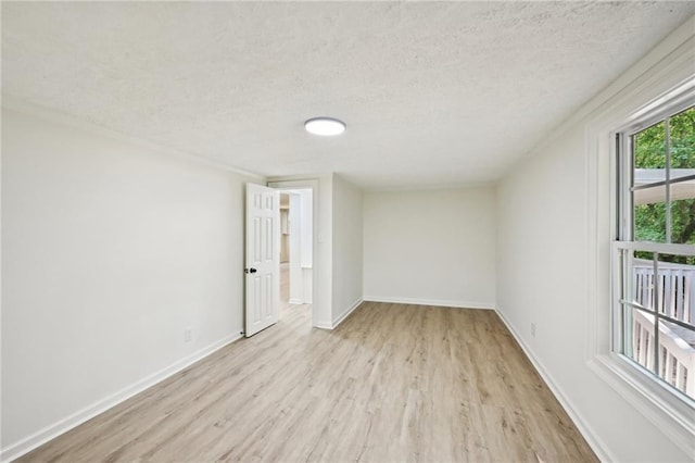 6201 Davids Way SE, Acworth, GA 30102 - unfurnished room featuring light wood-type flooring, a textured ceiling, and baseboards