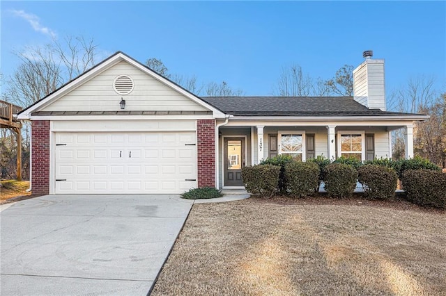 single story home featuring an attached garage, covered porch, brick siding, concrete driveway, and a chimney