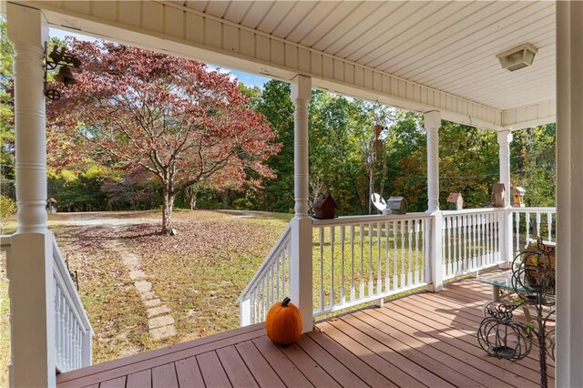 wooden deck featuring a porch