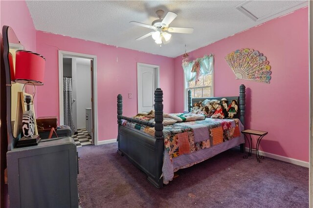 carpeted bedroom featuring a textured ceiling, ensuite bath, and ceiling fan