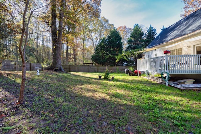 view of yard with a deck