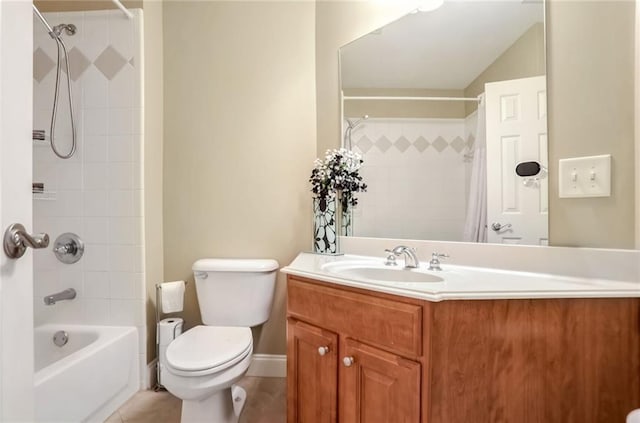 full bathroom featuring toilet, vanity, and tiled shower / bath combo