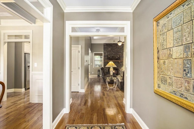 212 Westwind Dr, Newnan, GA 30263 - corridor with wood finished floors and crown molding