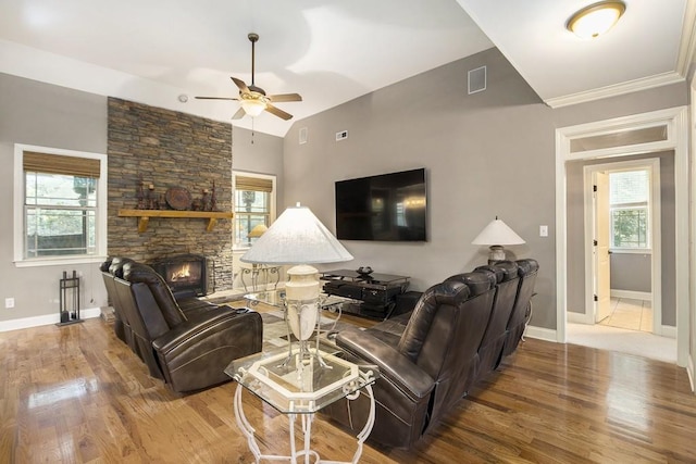 212 Westwind Dr, Newnan, GA 30263 - living room featuring ceiling fan, a stone fireplace, and wood finished floors