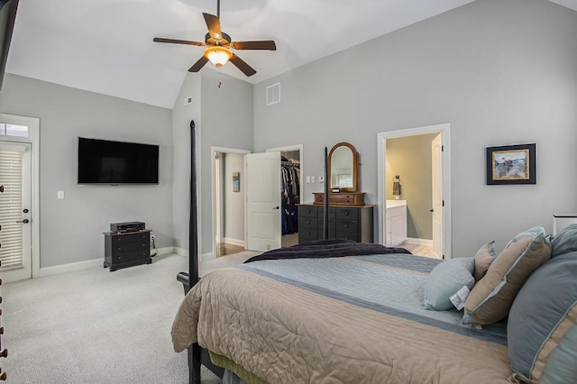 212 Westwind Dr, Newnan, GA 30263 - bedroom with light carpet, a walk in closet, connected bathroom, high vaulted ceiling, and ceiling fan