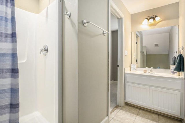 212 Westwind Dr, Newnan, GA 30263 - bathroom with a shower with curtain, tile patterned floors, and vanity