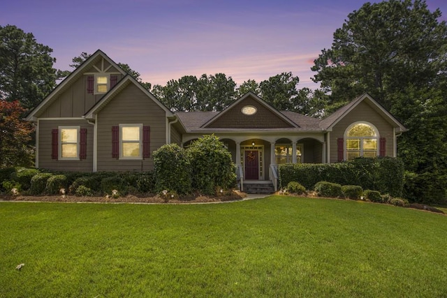 212 Westwind Dr, Newnan, GA 30263 - view of front of property with a front yard, board and batten siding, and a porch