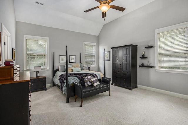 212 Westwind Dr, Newnan, GA 30263 - bedroom featuring light carpet, lofted ceiling, and a ceiling fan