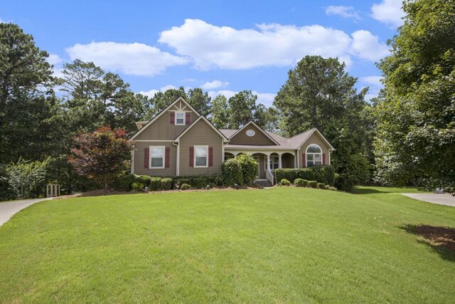 212 Westwind Dr, Newnan, GA 30263 - view of front of house featuring a front lawn and board and batten siding