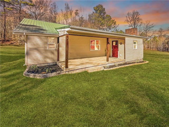 view of front of house with a lawn