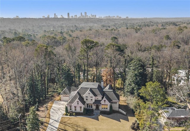 drone / aerial view with a view of trees