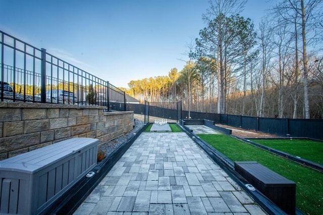 149 Avalon Way, Sharpsburg, GA 30277 - fenced backyard featuring a patio area