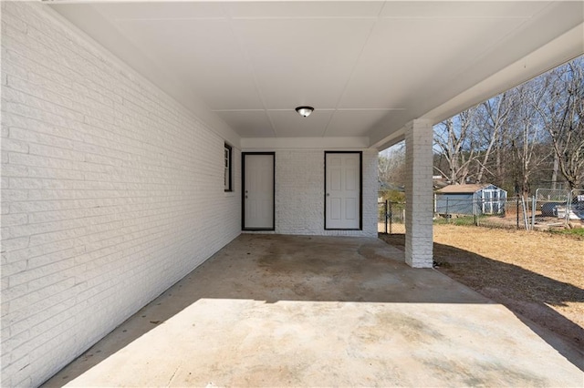 entrance to property with a carport