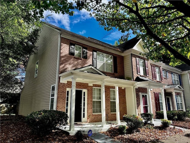 view of front facade featuring brick siding