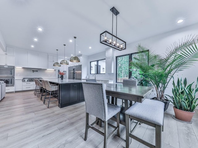 106 Belmont Dr, Canton, GA 30115 - dining space featuring light wood finished floors and recessed lighting