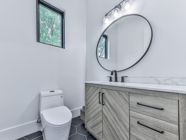 106 Belmont Dr, Canton, GA 30115 - half bathroom with plenty of natural light, vanity, and tile patterned flooring